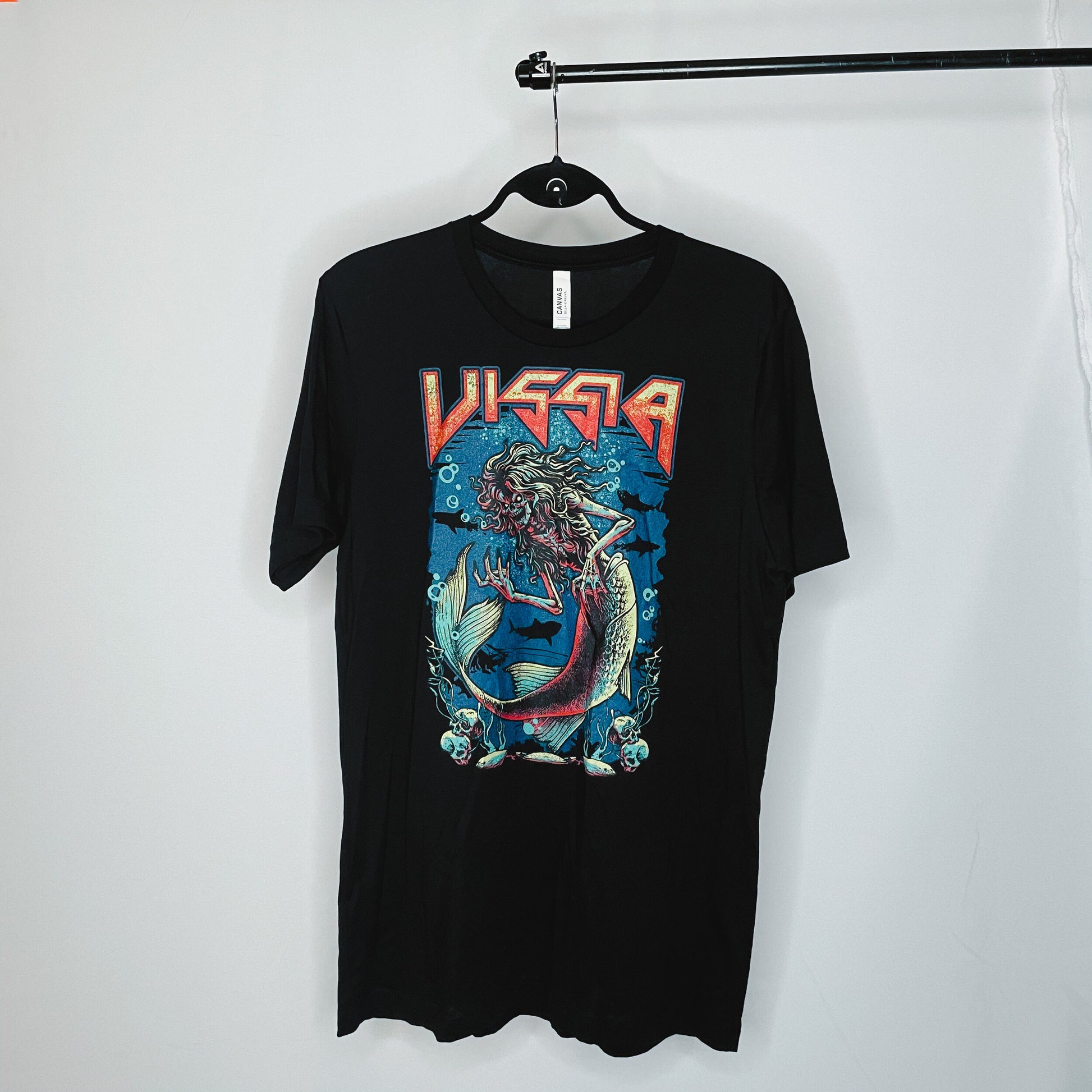 Black metal band style t-shirt; the t-shirt shows an illustration of a skeleton siren under the sea and "VISSIA" across the top