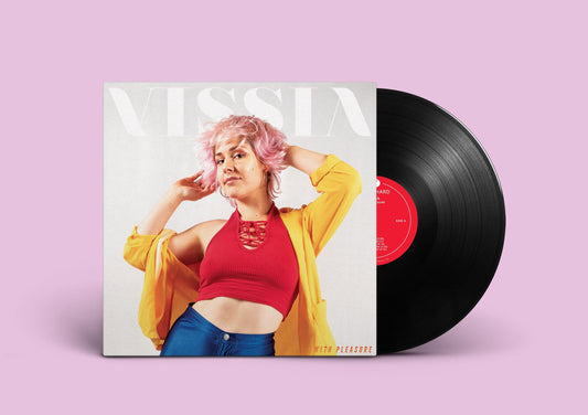 VISSIA With Pleasure black vinyl; the cover is a medium shot photo of a pink-haired woman on a white background; she is wearing silver hoop earrings, shiny blue disco pants, a fuschia halter top, and bright yellow light blazer